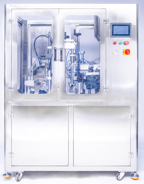 Auto tube filling and sealing machine