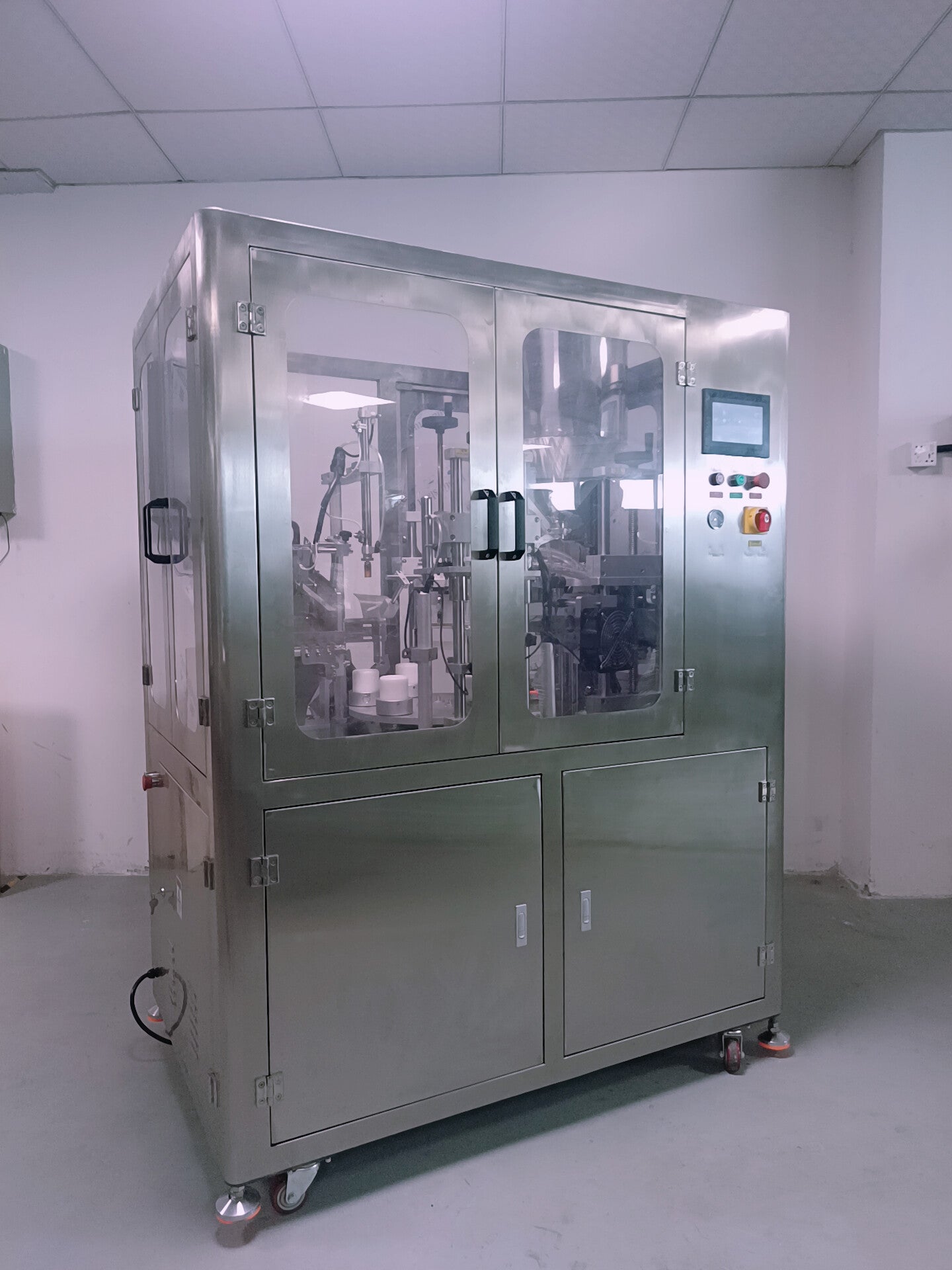 Auto tube filling and sealing machine