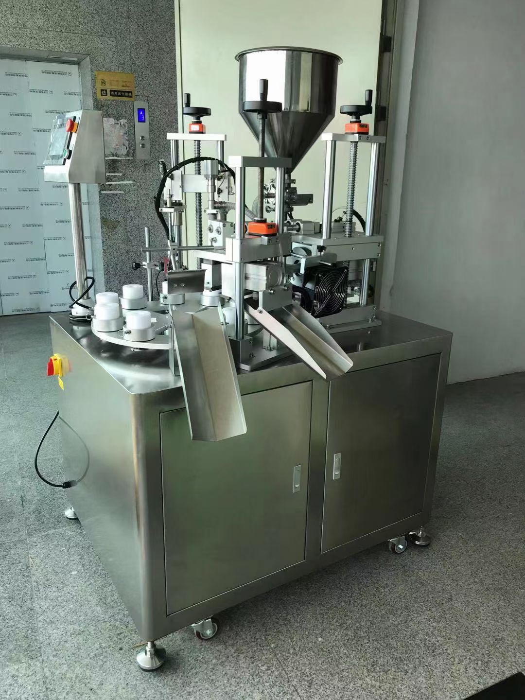 Semi-auto tube filling and sealing machine