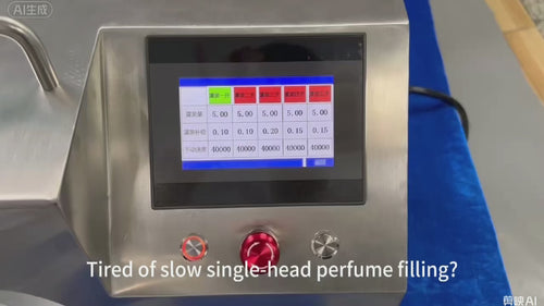Multi-head vacuum filling system for efficient perfume and fragrance bottle filling.